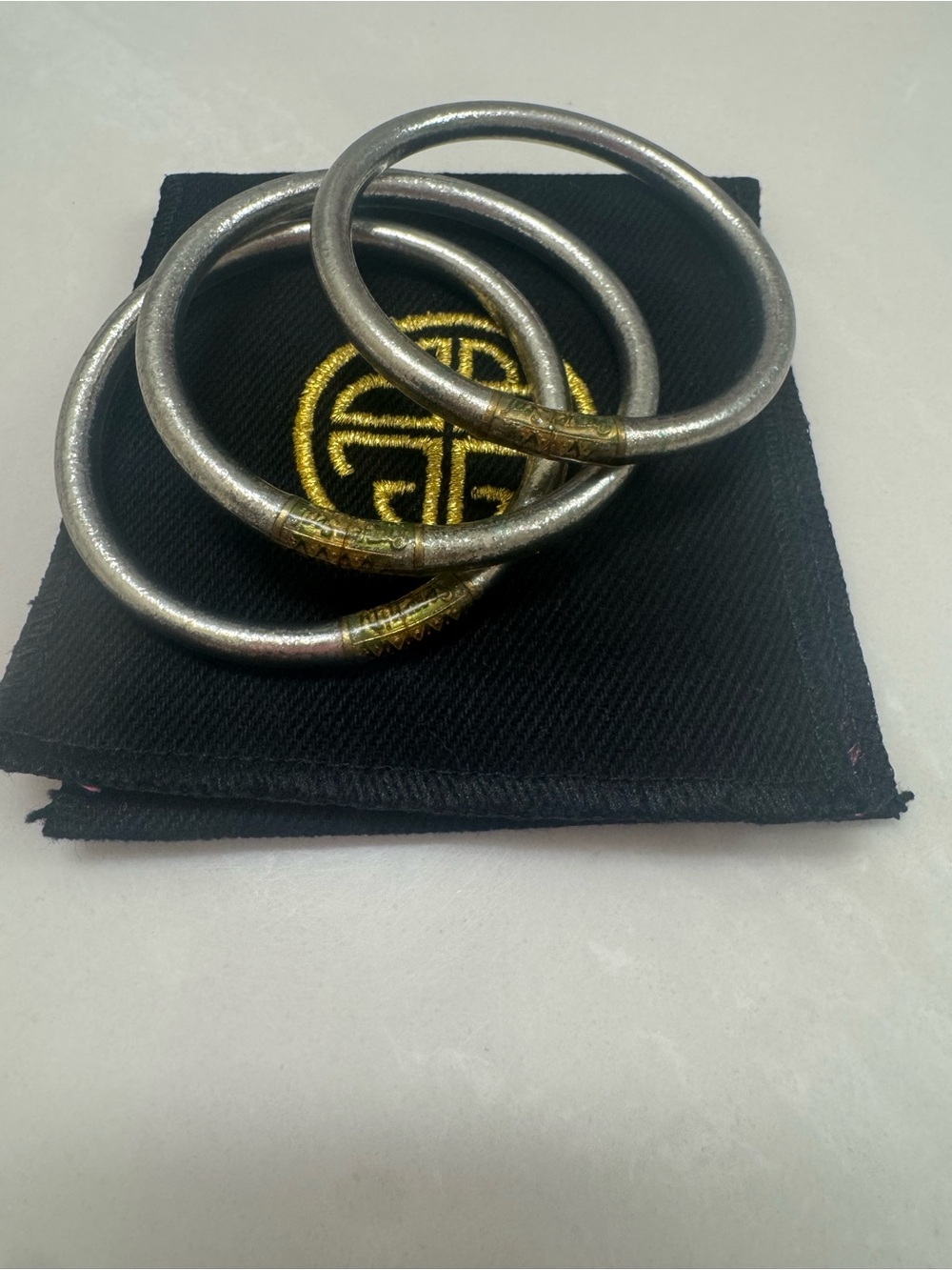 BuDhaGirl silver  All Weather Bangles size small with pouch